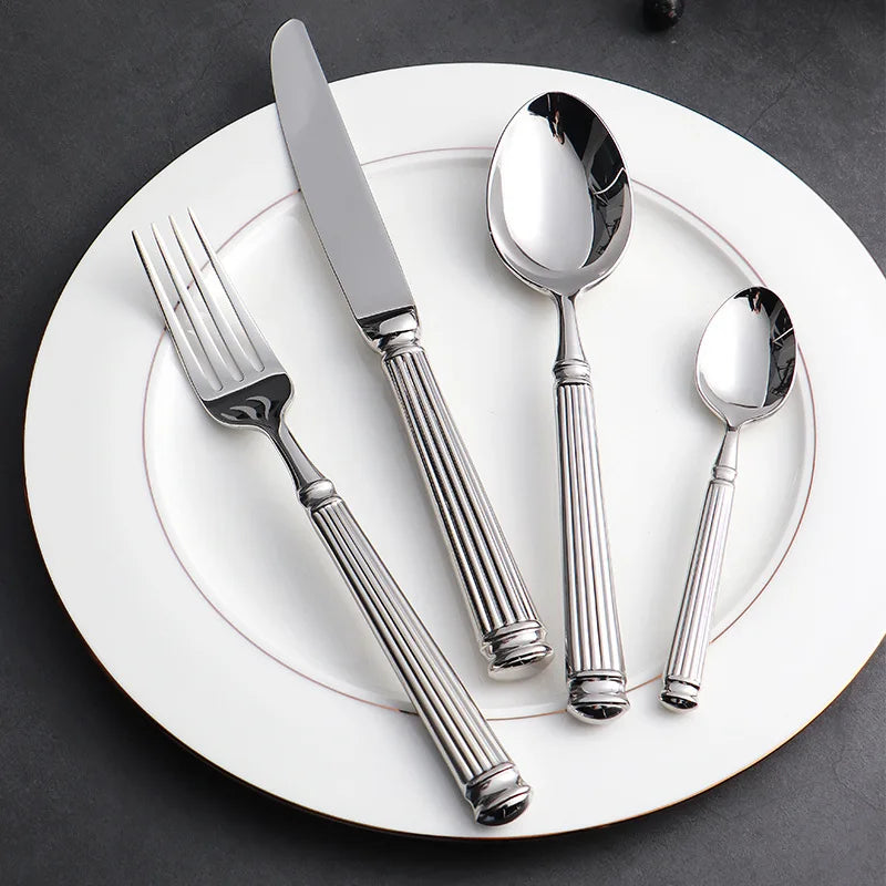 Luxury 18/10 Stainless Steel Cutlery Set. This exquisite set is designed for those who appreciate elegance and functionality in their tableware.  - Volaia